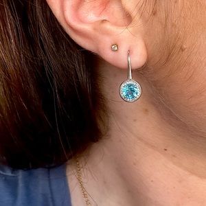 Flashy 14k white gold blue topaz hanging earrings with pavé diamond halo